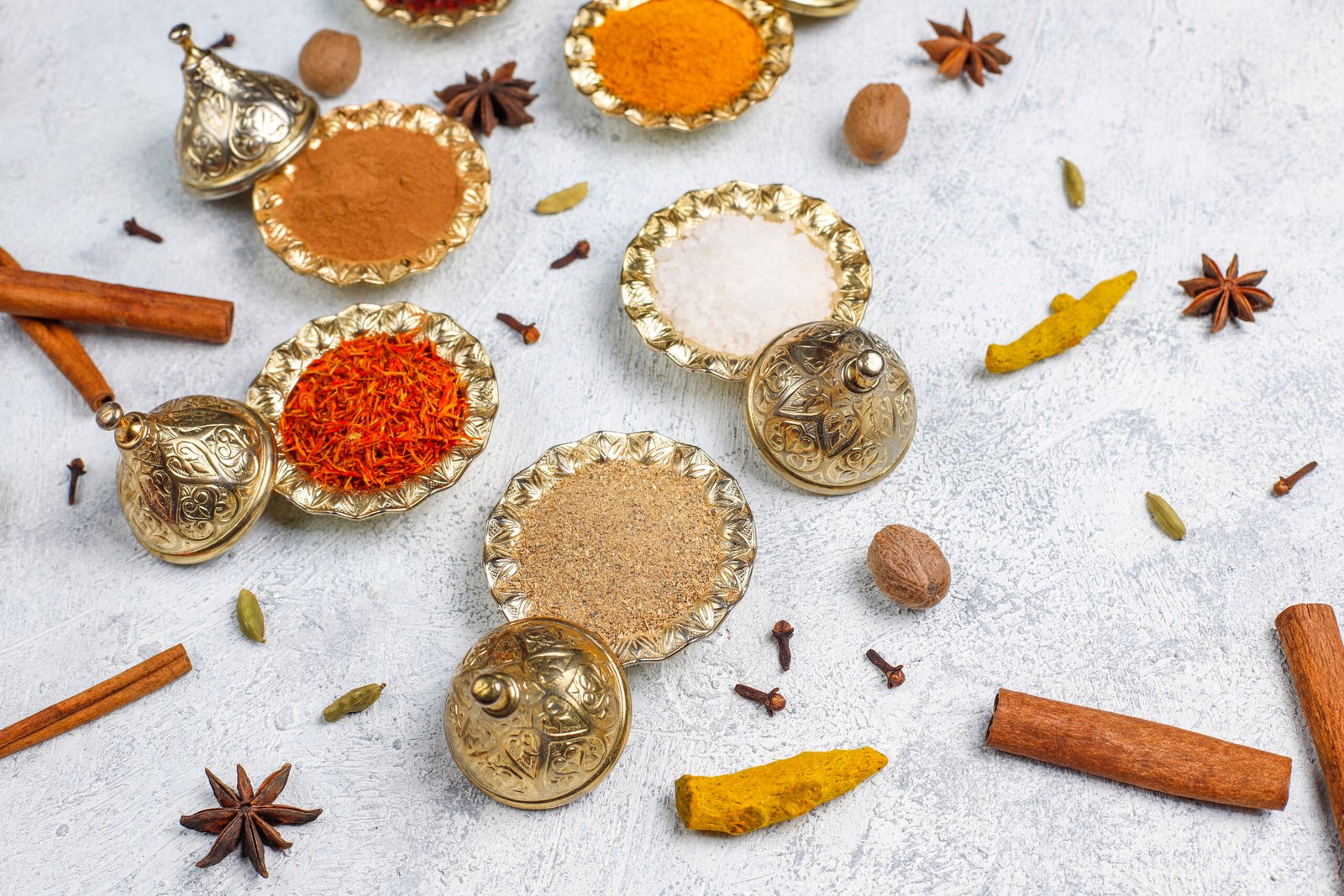 Assorted spices on light background.Curry, paprika, pepper,coria